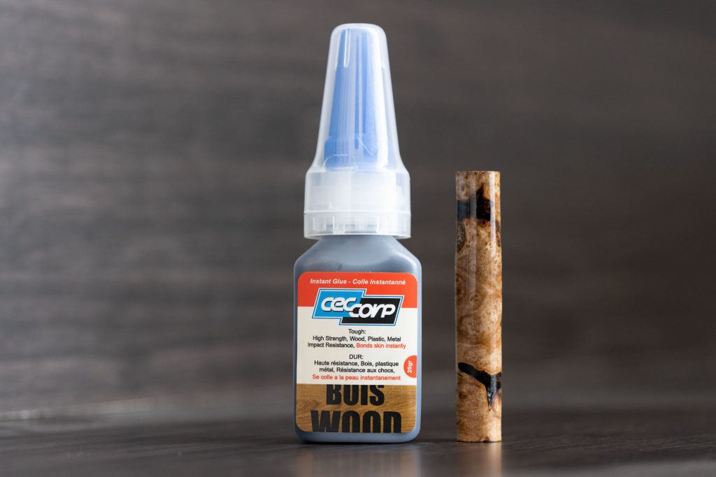 C-Bond medium black CA glue (Cyanoacrylate) 20g made by CEC Corp and a maple burl wood pen blank for pen turning, finishing and repairing