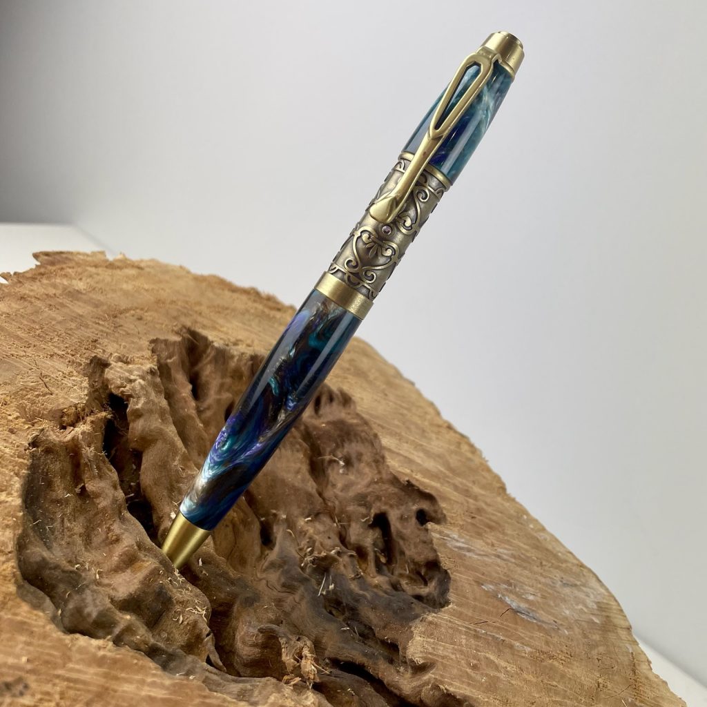 Fillibelle ballpoint twist pen kit from William Wood-Write in Antique brass, made with a Lava Explosion Middle Earth pen blank