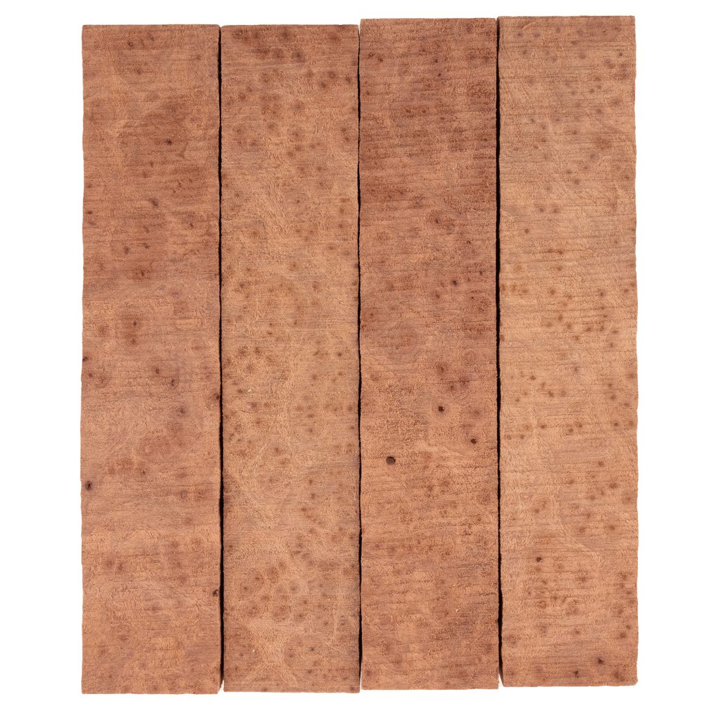 Four Redwood lace burl pen blanks from William Wood-Write Ltd lined up against white background