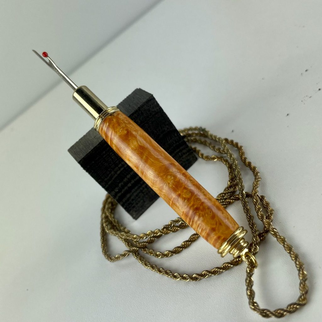 Seam Ripper Necklace project kit in gold from William Wood-Write Ltd made with exceptional stabilized curly maple pen blank in orange