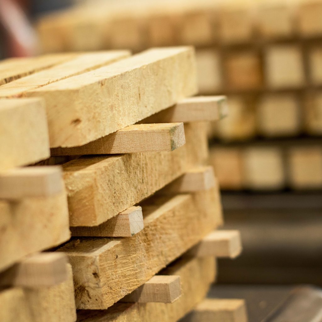 Burl pen blanks for wood turning are stacked up to dry.