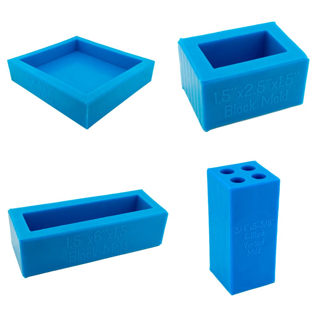 Four blue silicone molds for casting resin in various rectangle shapes on a white background.