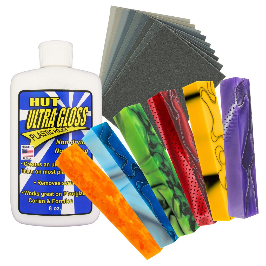 A bottle of hut plastic polish, six acrylic pen blanks in different colours and a set of micro mesh sheets on a white background.