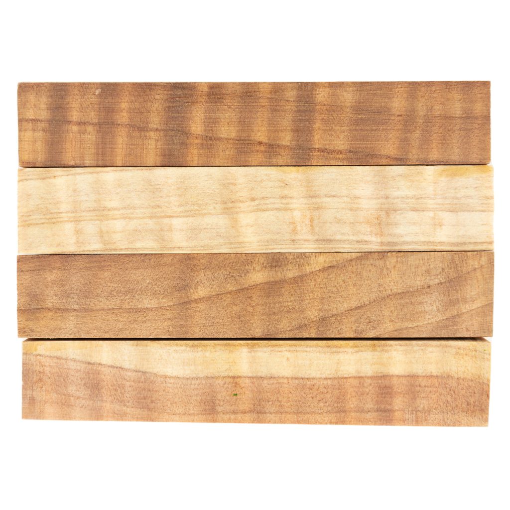 Four pen blanks cut from curly redwood for wood turning, which is a reddish coloured wood with shimmery stripes.